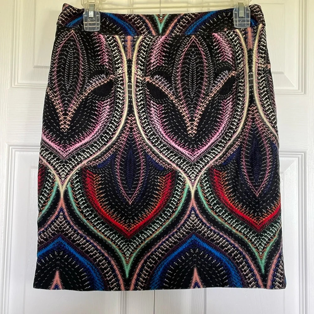 Etcetera corduroy sz 4 skirt. Colorful design black back zip & split